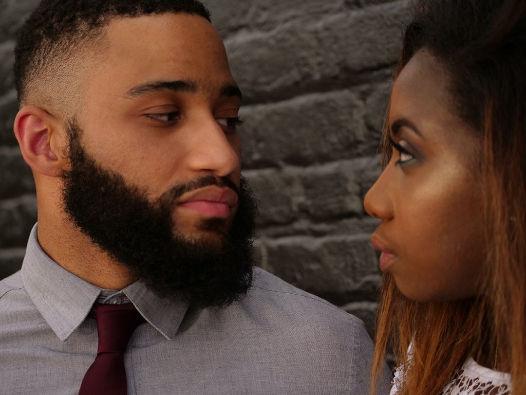 Couple talking about their unexpected pregnancy